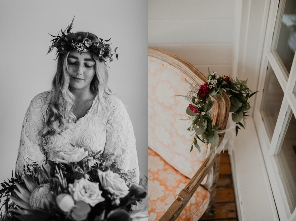 Collage of two images. Left image is a black and white bridal portrait. Bride in lace wedding gown and floral crown is looking down at her large boho-inspired wedding bouquet. Right image is of the bride's flower crown resting on top of a vintage upholstered chair. Captured at The Clearing in Shedden, ON.