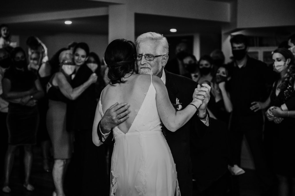 A bride and her father share their father-daughter dance at Cellar 52 in St Jacobs Ontario.
