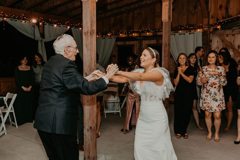 A bride and her grandfather share a dance at her Century Barn wedding in denfield, ontario.